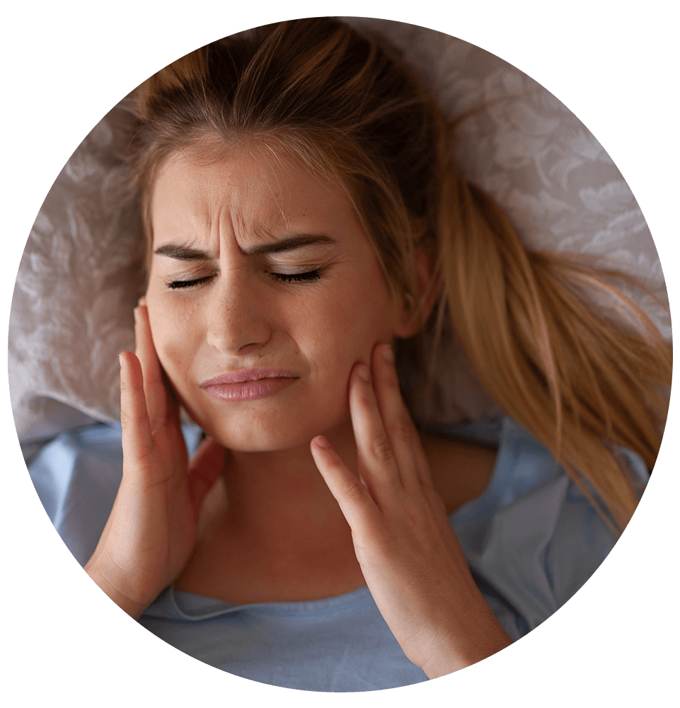 female grinding their teeth in their sleep